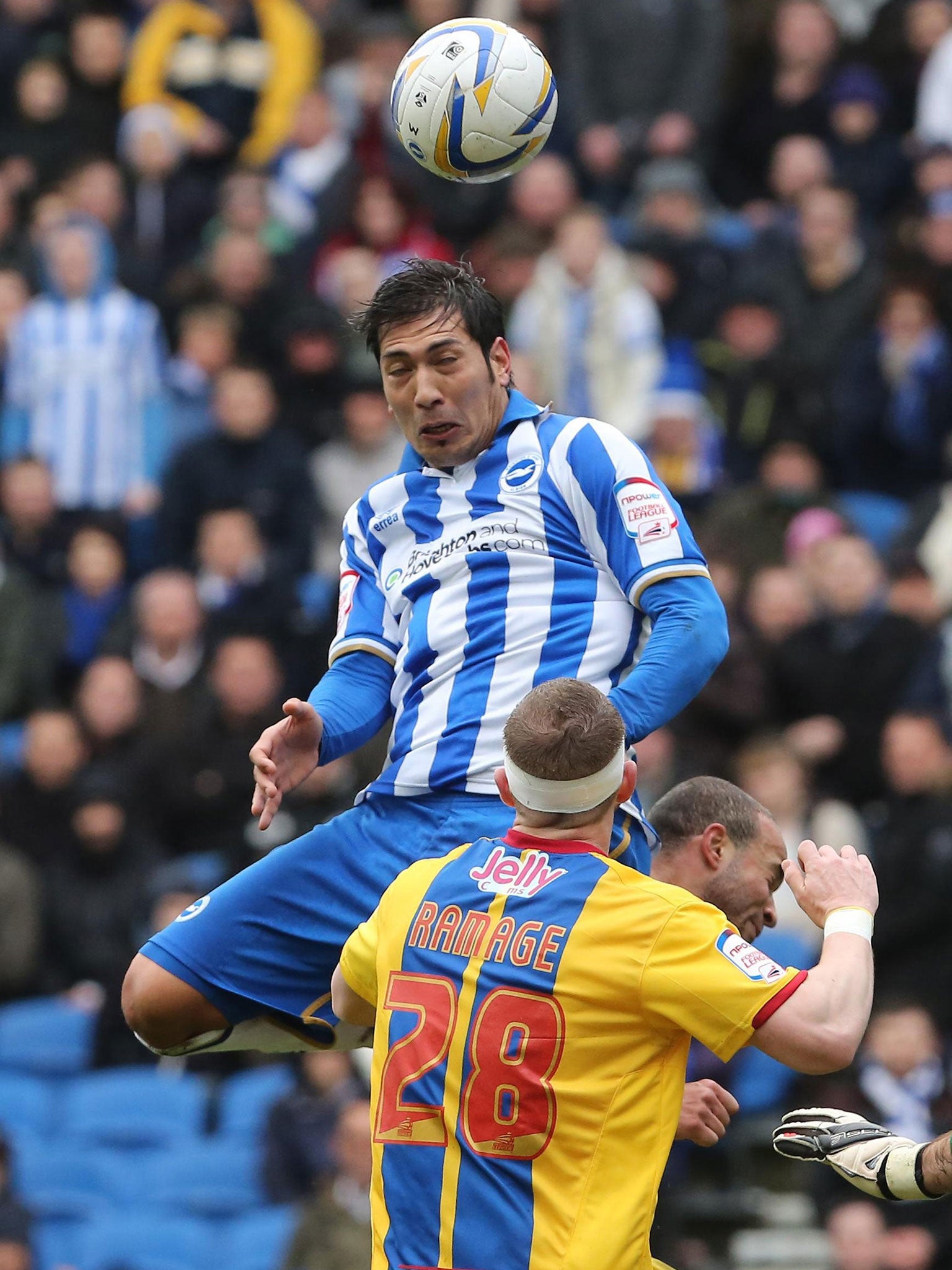 Leonardo Ulloa leaps high to head Brighton’s opening goal