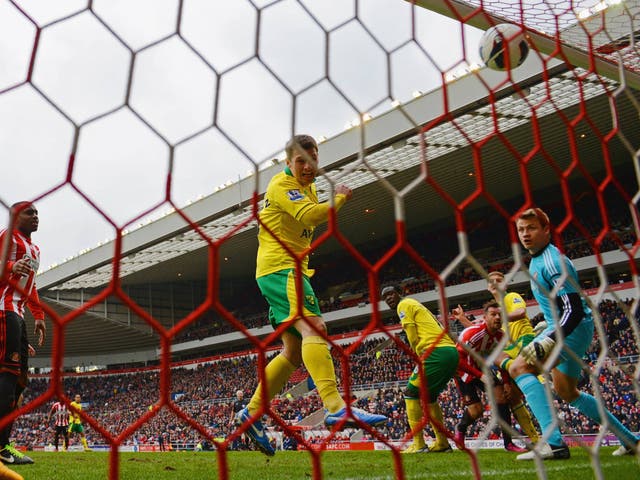 Wesley Hoolahan of Norwich scores to make it 1-0 against Sunderland. The match ended 1-1