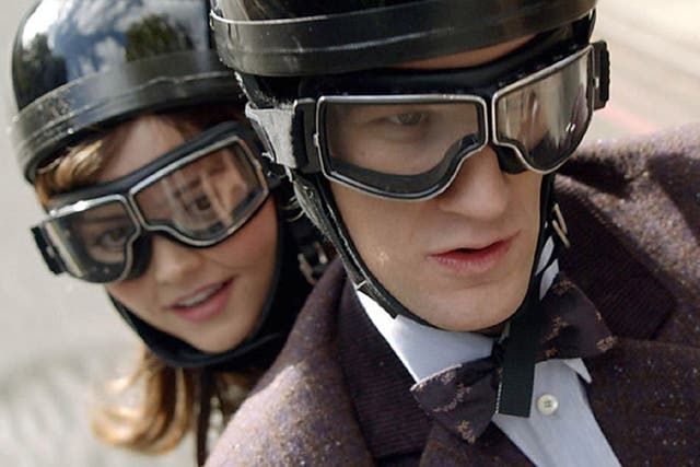 Clara and the Doctor on a motorbike