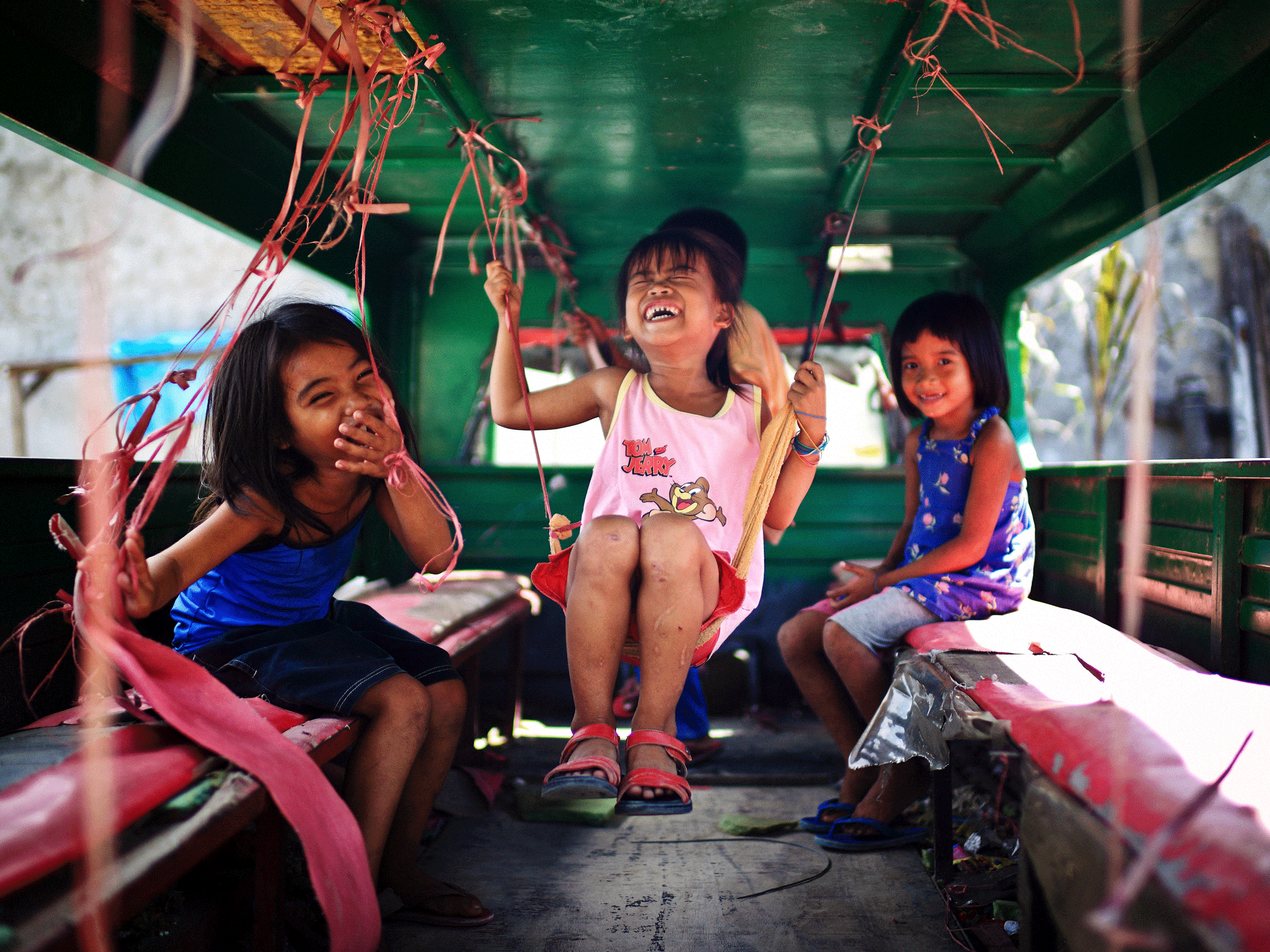 Winner, Smile, Open Competition 2013 Sony World Photography Awards 'I just took my camera and walked away from the crowd. I was in a slum which is not far away. Kids here were so curious about this foreigner and his camera. They just wanted to be the centre of it. Life here is so pure and simple.' Taken in CEBU City, Philippines Copyright: ©Ming Hui Guan/Mac Kwan, China