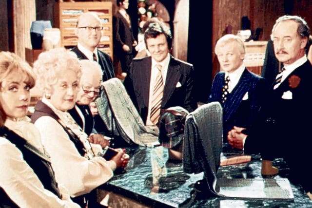 Thornton, far right, with the staff at Grace Brothers; although he was typecast as Captain Peacock, he never regretted taking the role