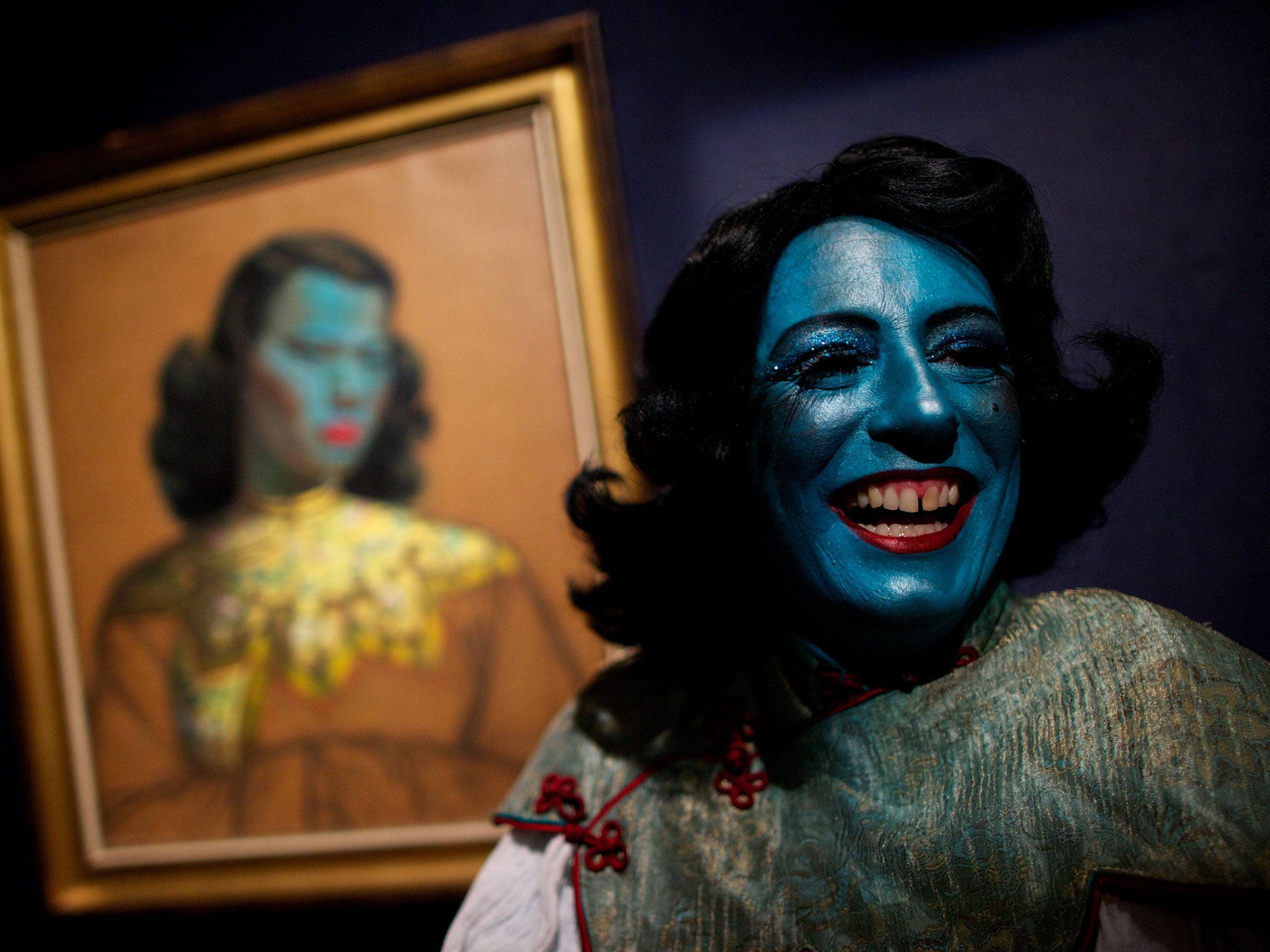 Cabaret singer Tricity Vogue dressed as the blue lady