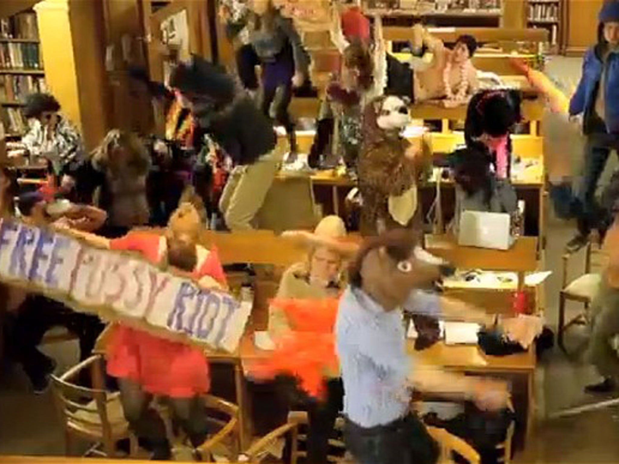 Outraged Oxford university students have called for a librarian to be reinstated after she was fired for letting students make a Harlem Shake video on her watch