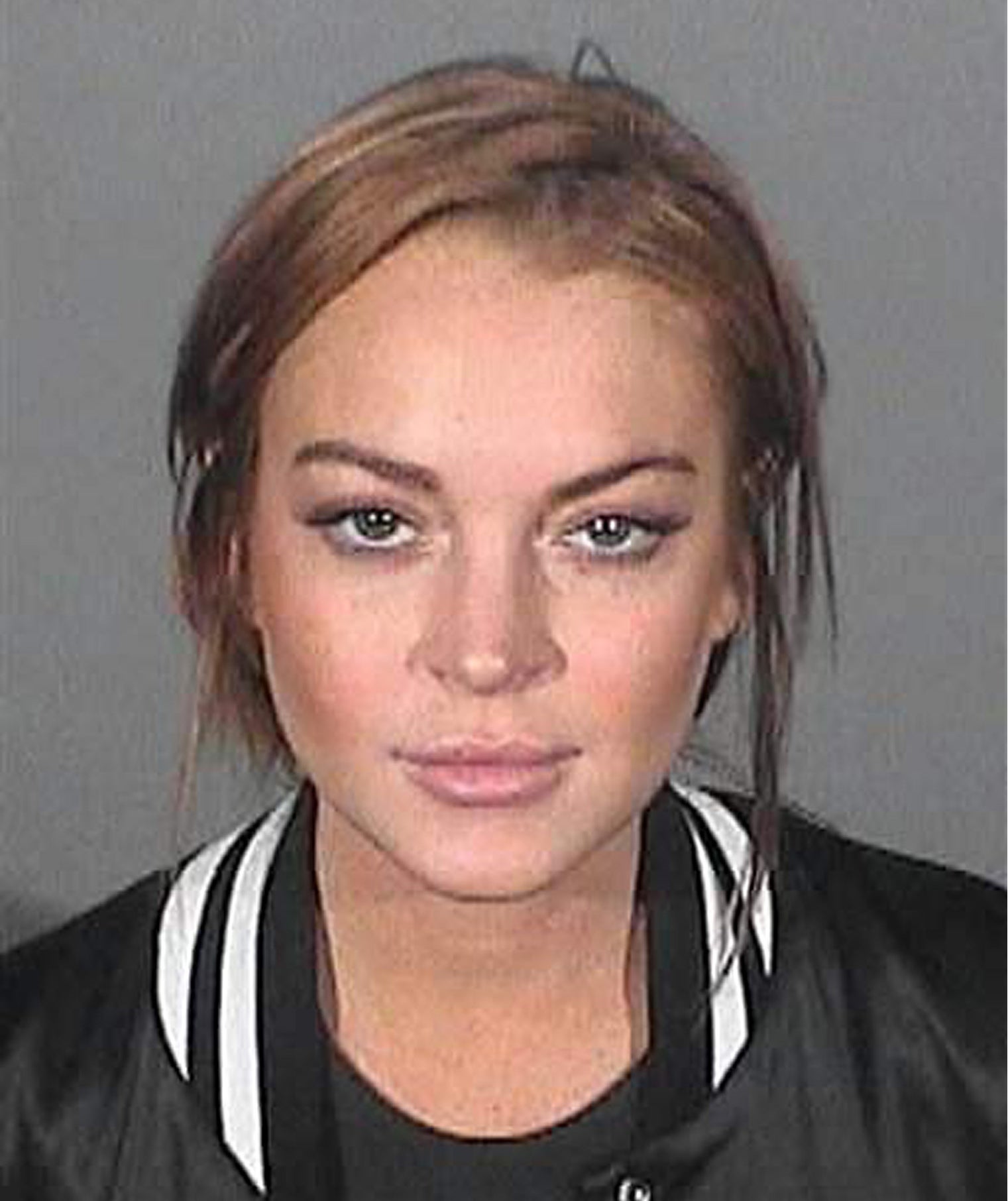 Booking photo mugshot of Lindsay Lohan, Santa Monica Police Department, California, 19 Mar 2013.