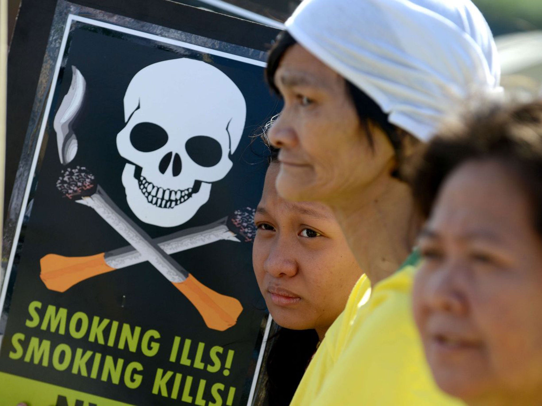 Anti-smoking campaigners protest in Manila