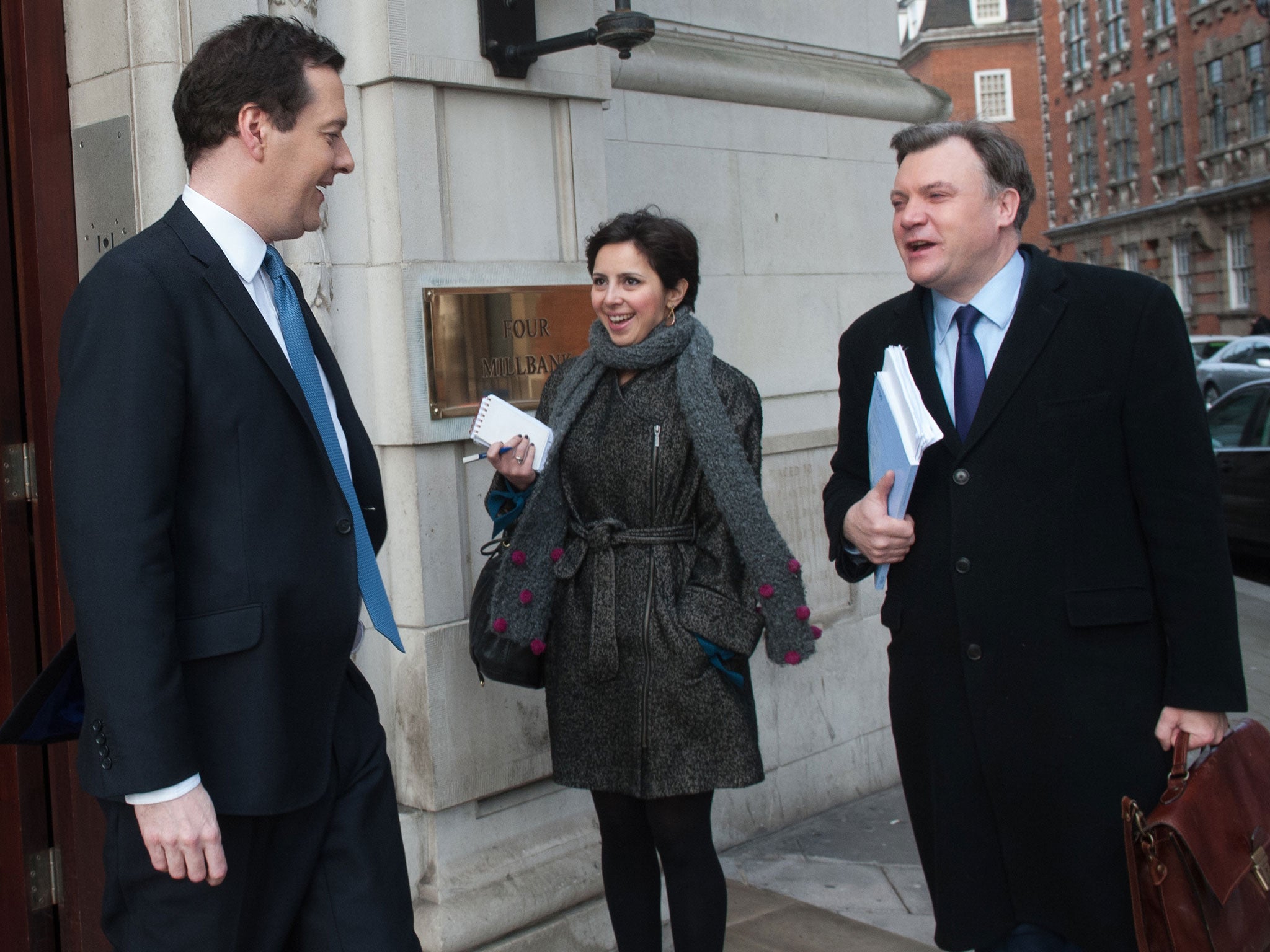 Chancellor George Osborne (left) comes face to face with Shadow Chancellor Ed Balls outside the Millbank studios in Westminster today