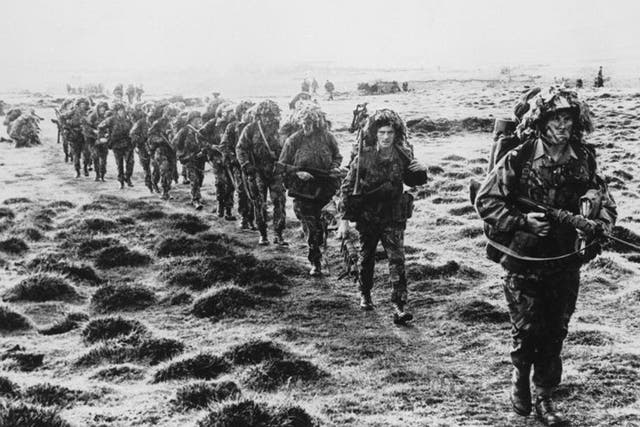 British soldiers cross the Falklands during the 1982 conflict