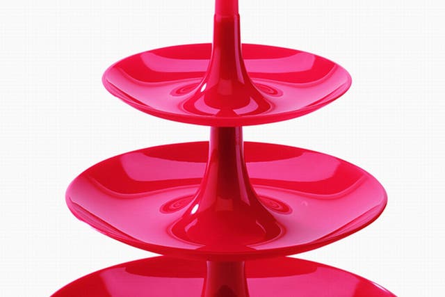 Babell Tiered Fruit Dish ?19.80, Koziol. This three-tiered plastic stand makes a red-hot table centrepiece. 0121 224 7728, redcandy.co.uk
