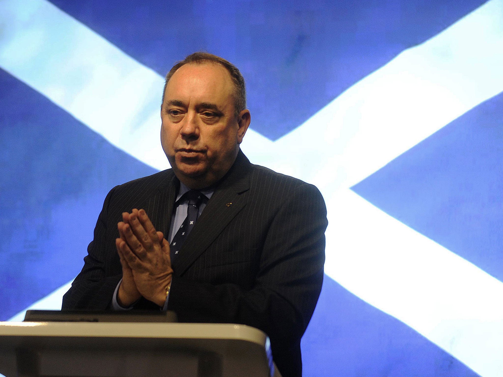 Scotland's First Minister Alex Salmond gestures during a press conference in St Andrews House in Edinburgh on October 15, 2012 after signing an agreement for a referendum on Scottish independence with the British prime minister.