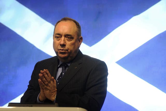 Scotland's First Minister Alex Salmond gestures during a press conference in St Andrews House in Edinburgh on October 15, 2012 after signing an agreement for a referendum on Scottish independence with the British prime minister.