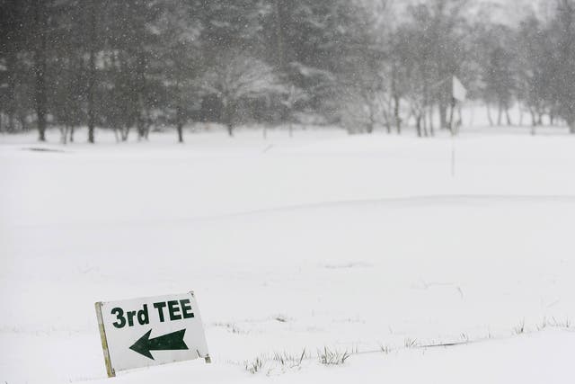 A golf course is hit by the weather