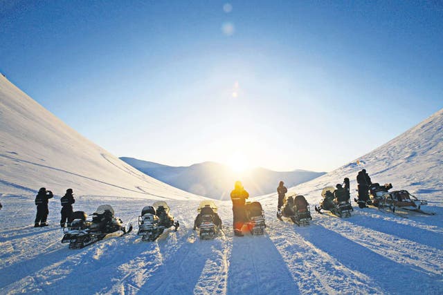 A snowmobile is the ideal way to reach Barentsburg in winter