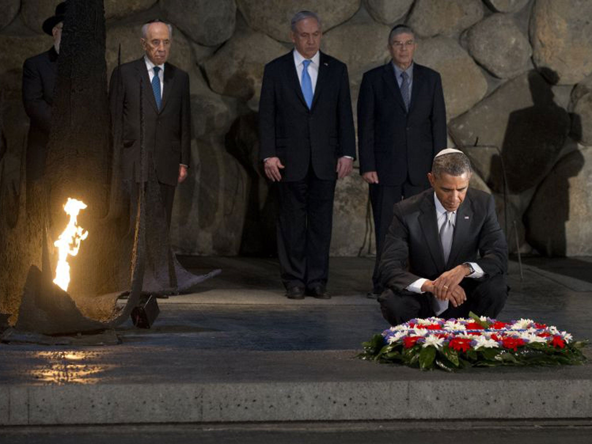 Barack Obama lays a wreath in the Hall of Remembrance at the Yad Vashem Holocaust Museum