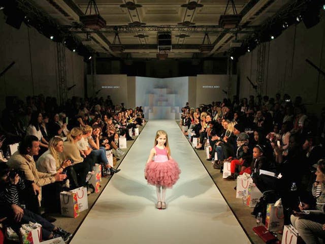 Child models take to the catwalk at the inaugural Global Kids Fashion Week show at London’s Freemasons Hall this week