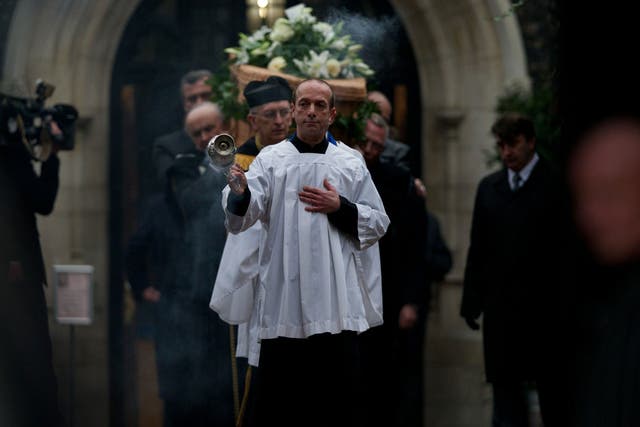 Last rites: The funeral of Bruce Reynolds in London on Wednesday