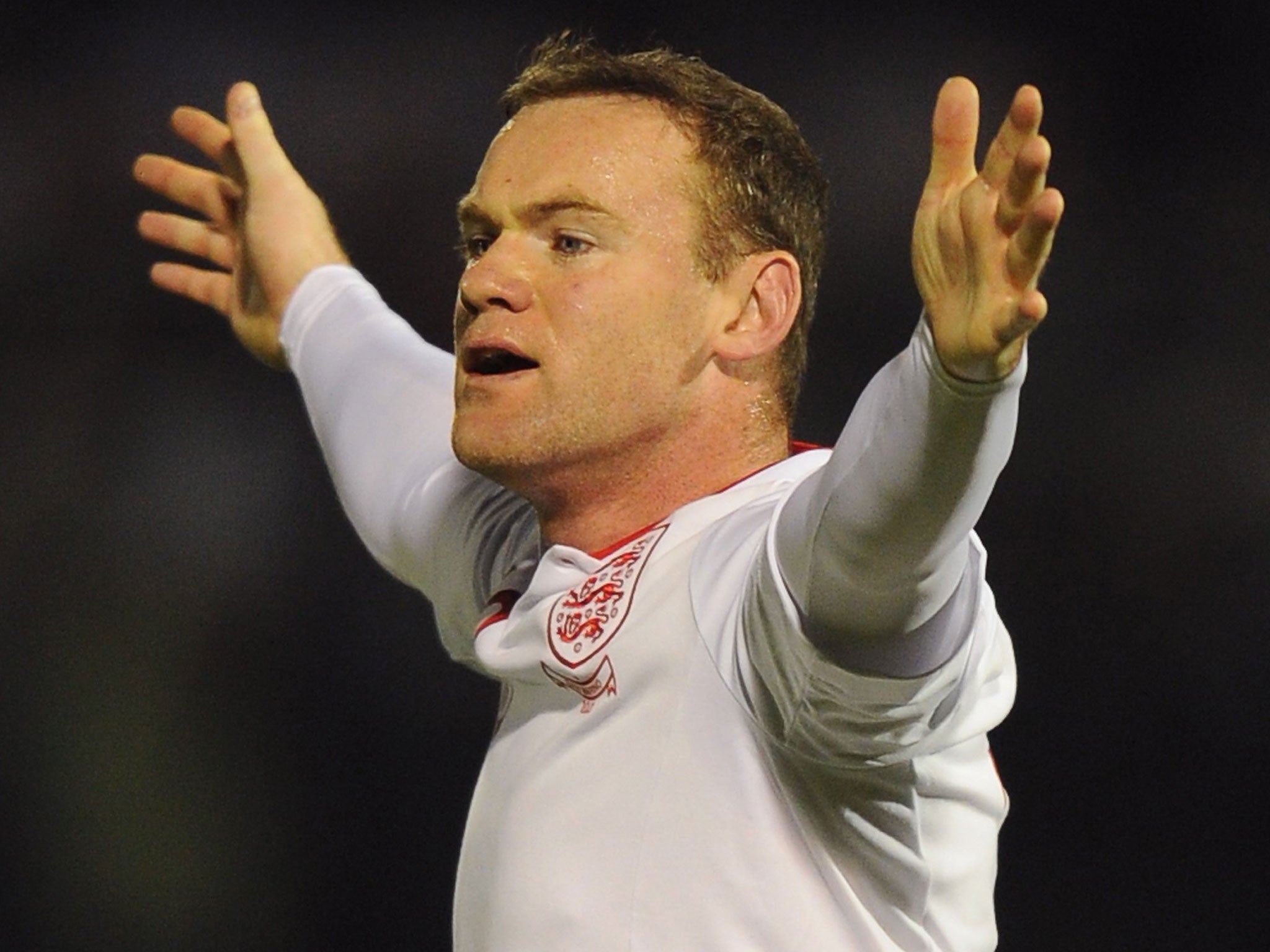 Main man: Wayne Rooney will have to cope with the pressure in Podgorica in the crucial qualifier against Montenegro