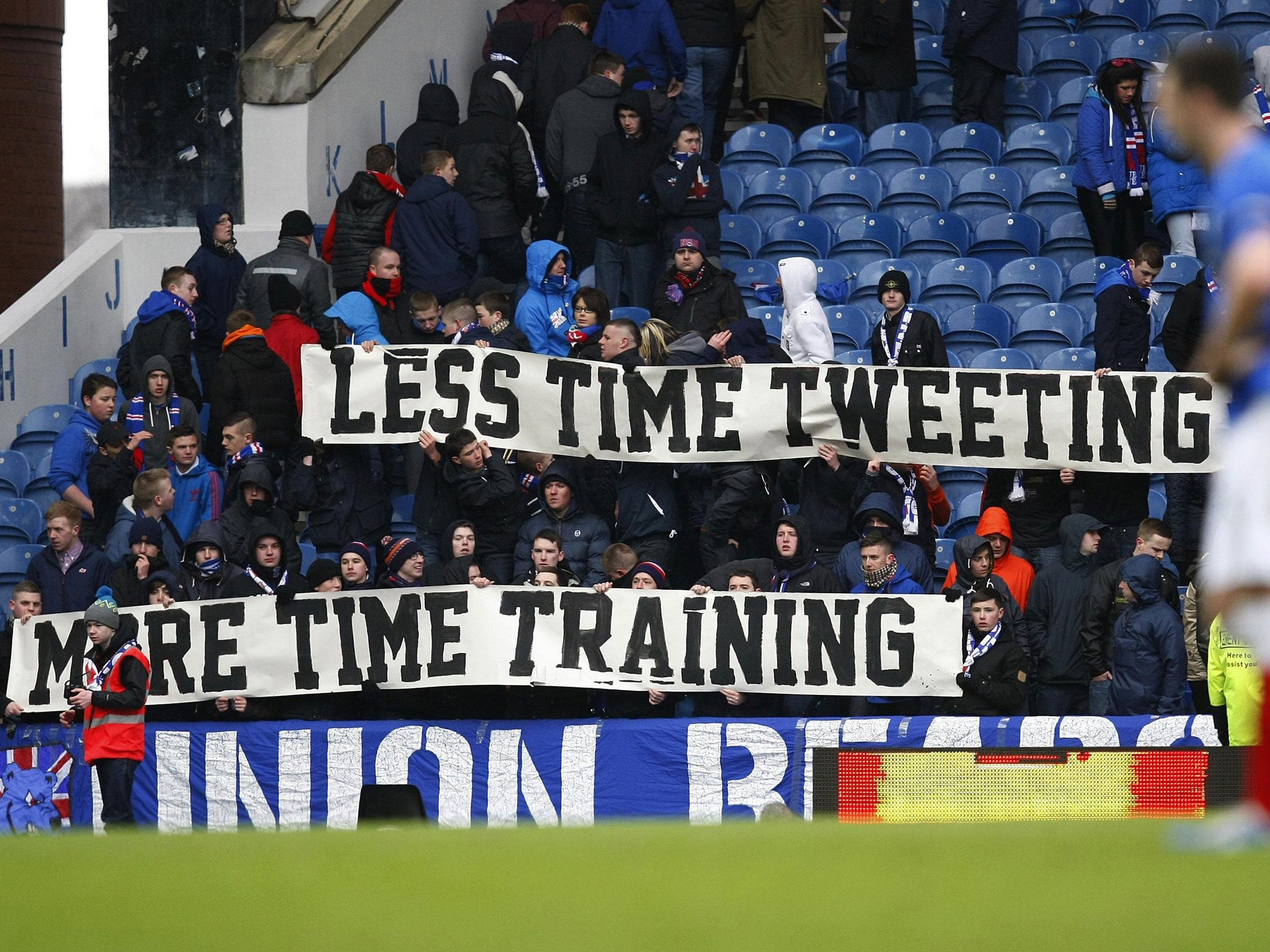 Sign of the times: Rangers fans unveil a banner reacting to poor recent form