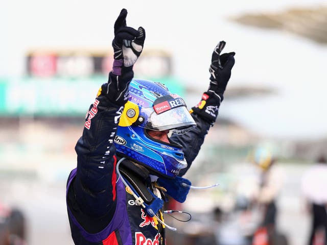 Sebastian Vettel celebrates his controversial victory in Malaysia