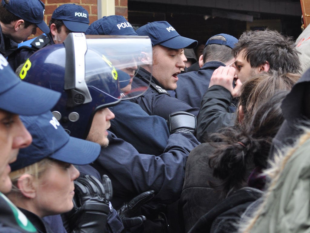 The outnumbered police were heckled into a corner by the hundreds of protesters