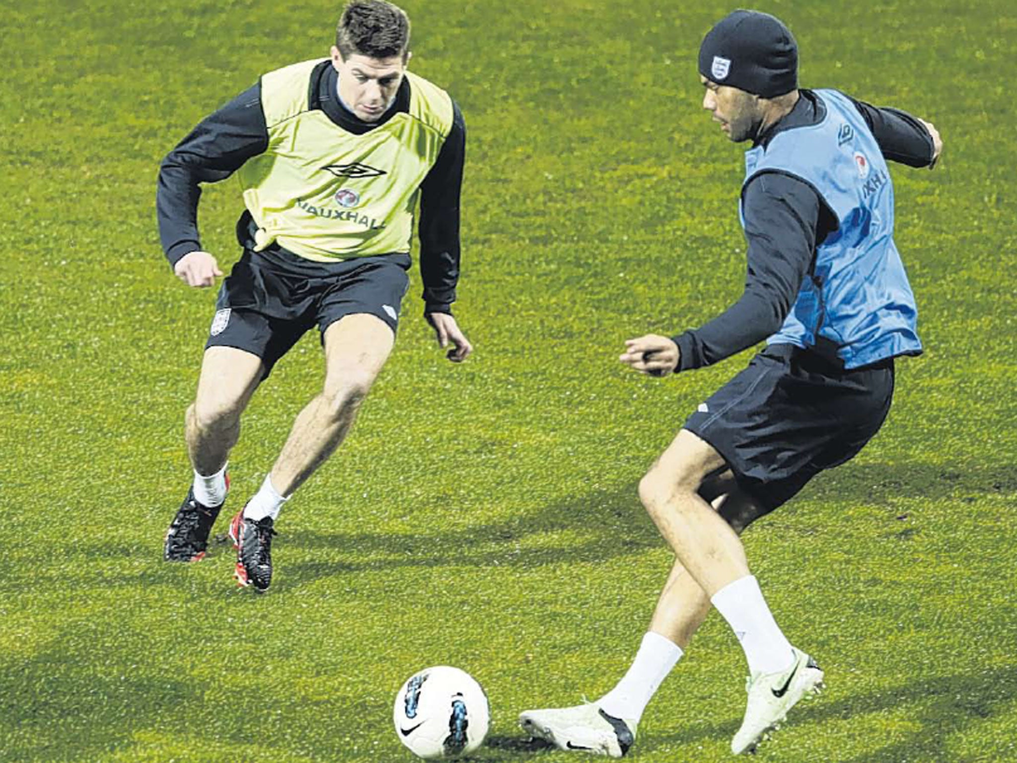 Steven Gerrard (left) and Joleon Lescott during training at the Podgorica City Stadium yesterday