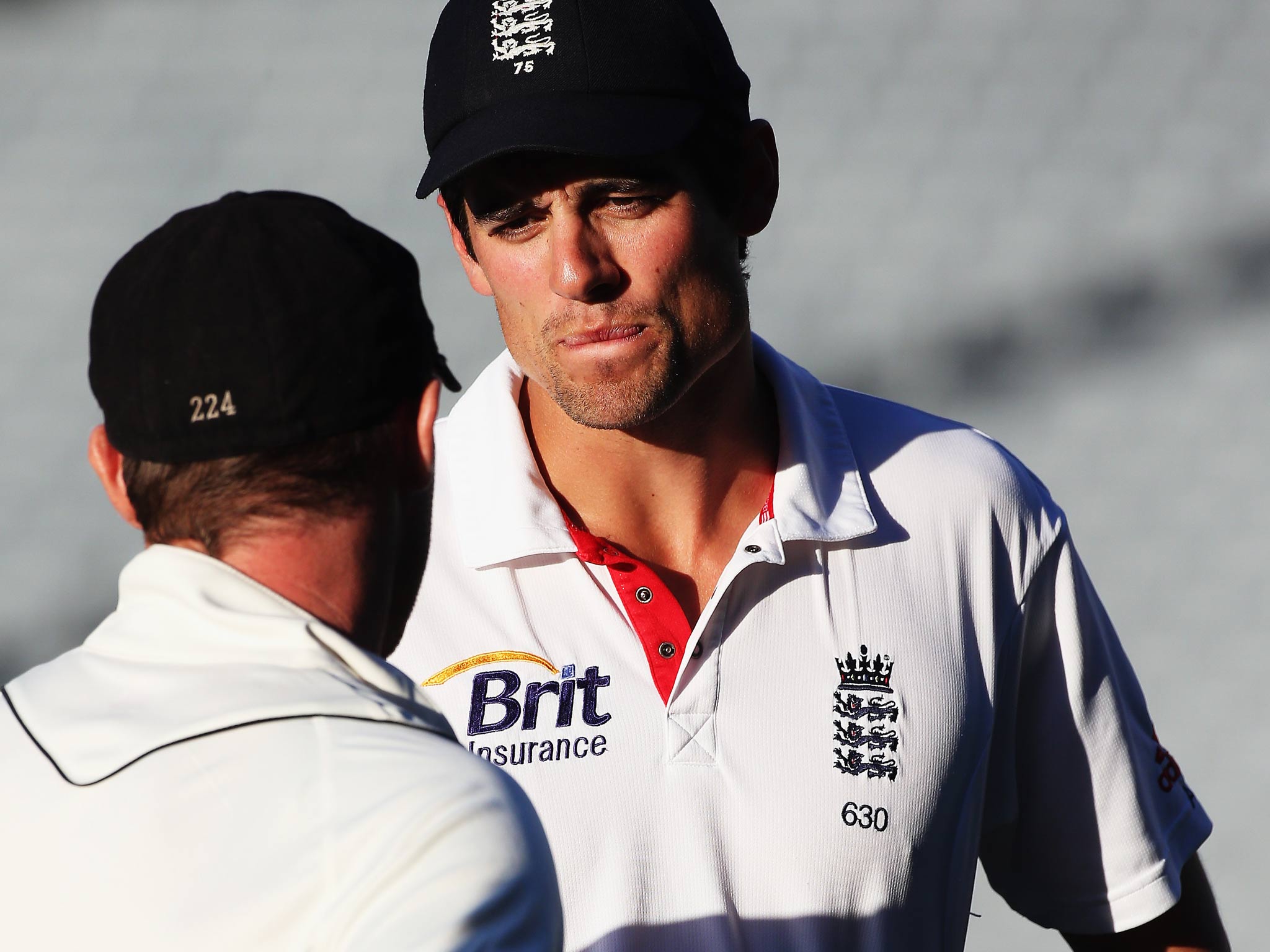 Brendon McCullum of New Zealand talks to England captain Alastair Cook following the series draw