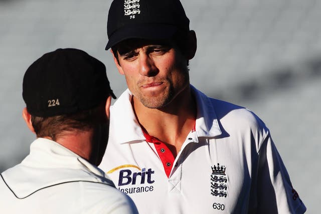 Brendon McCullum of New Zealand talks to England captain Alastair Cook following the series draw