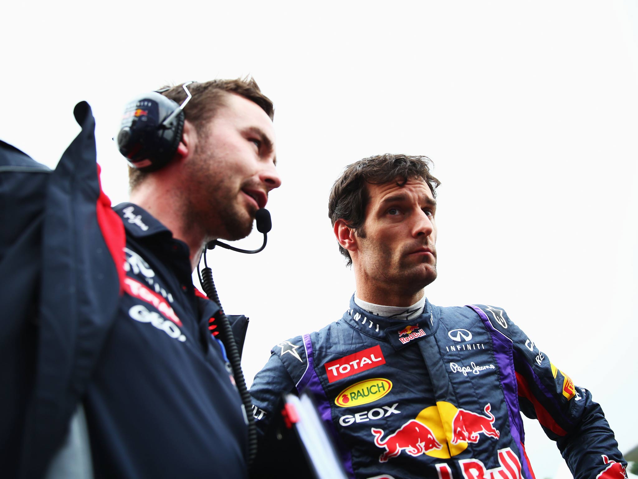 Mark Webber of Australia and Infiniti Red Bull Racing talks with his race engineer Simon Rennie