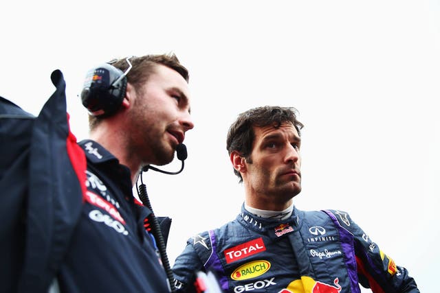 Mark Webber of Australia and Infiniti Red Bull Racing talks with his race engineer Simon Rennie