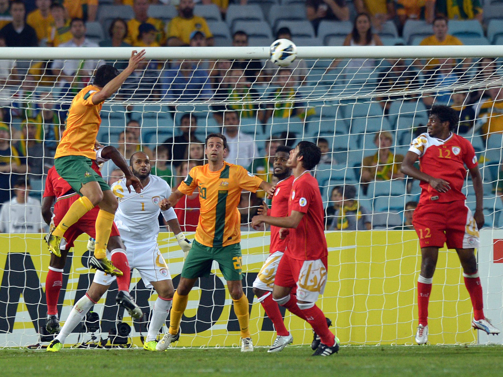 Tim Cahill pulls a goal back for Australia against Oman in a World Cup qualifier