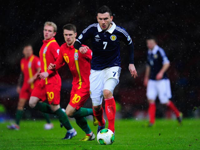 Robert Snodgrass in action for Scotland against Wales