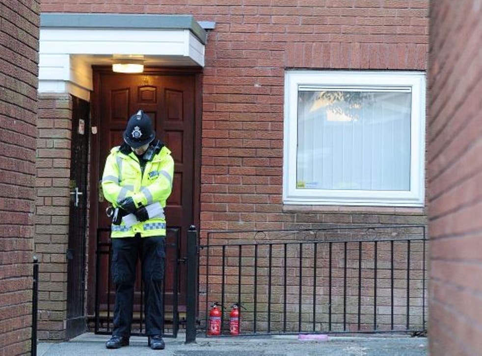 A police officer guards the house in Atherton where Jade Anderson was found dead