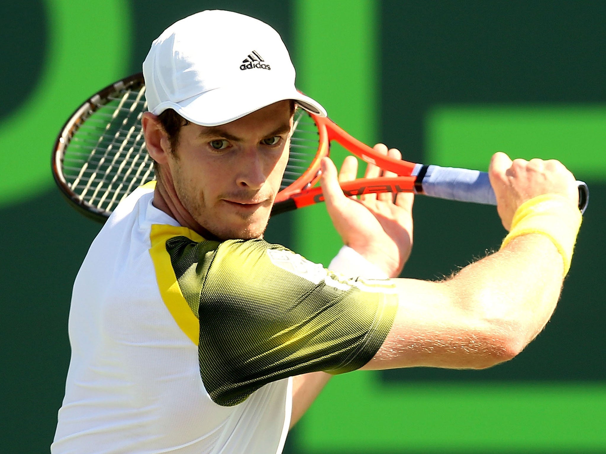 Andy Murray hits a return during his victory over Andreas Seppi