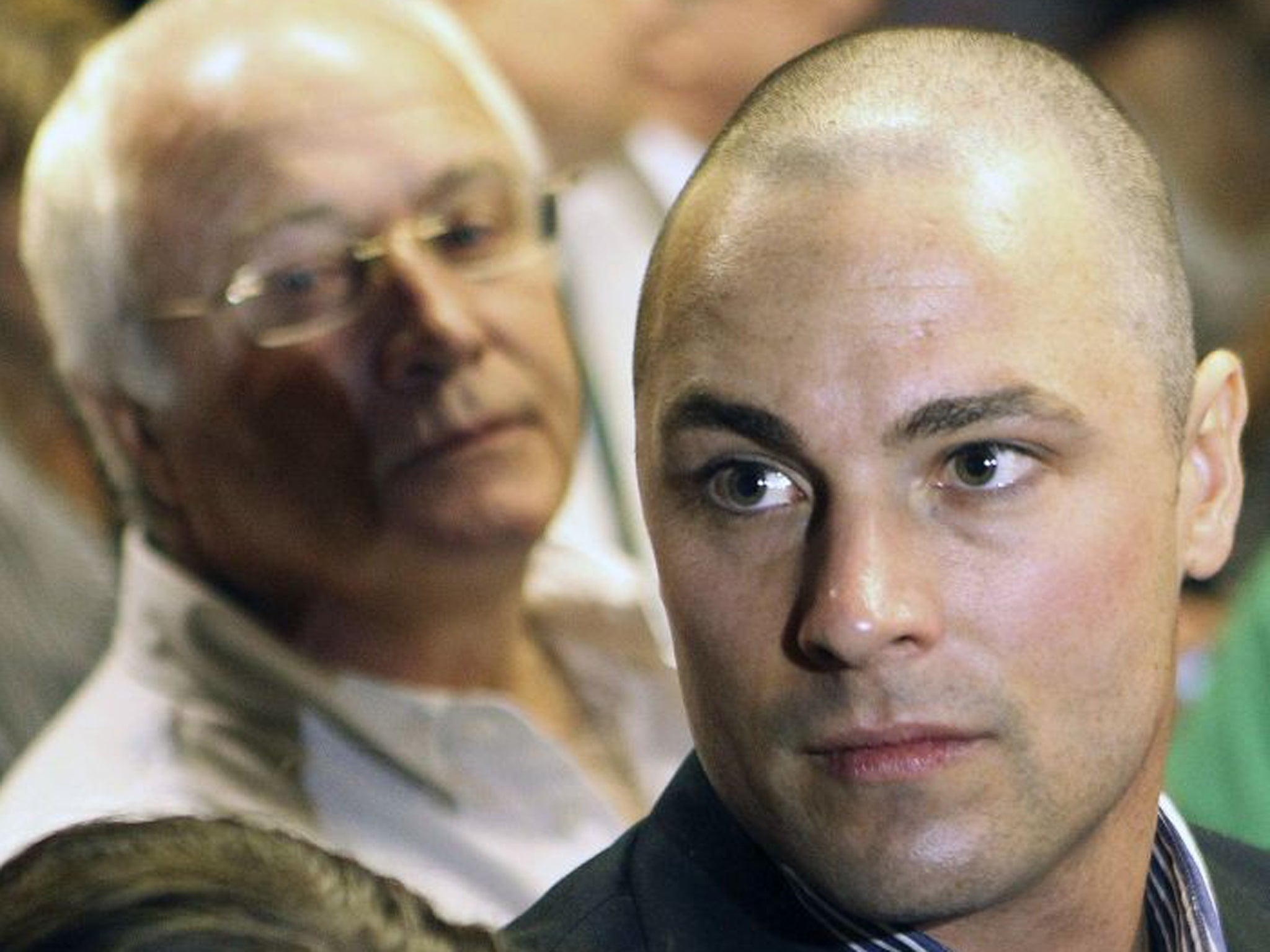 Carl Pistorius, right, and Henke Pistorius, the brother and father of Olympic athlete Oscar Pistorius