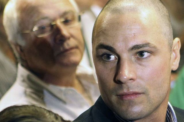 Carl Pistorius, right, and Henke Pistorius, the brother and father of Olympic athlete Oscar Pistorius