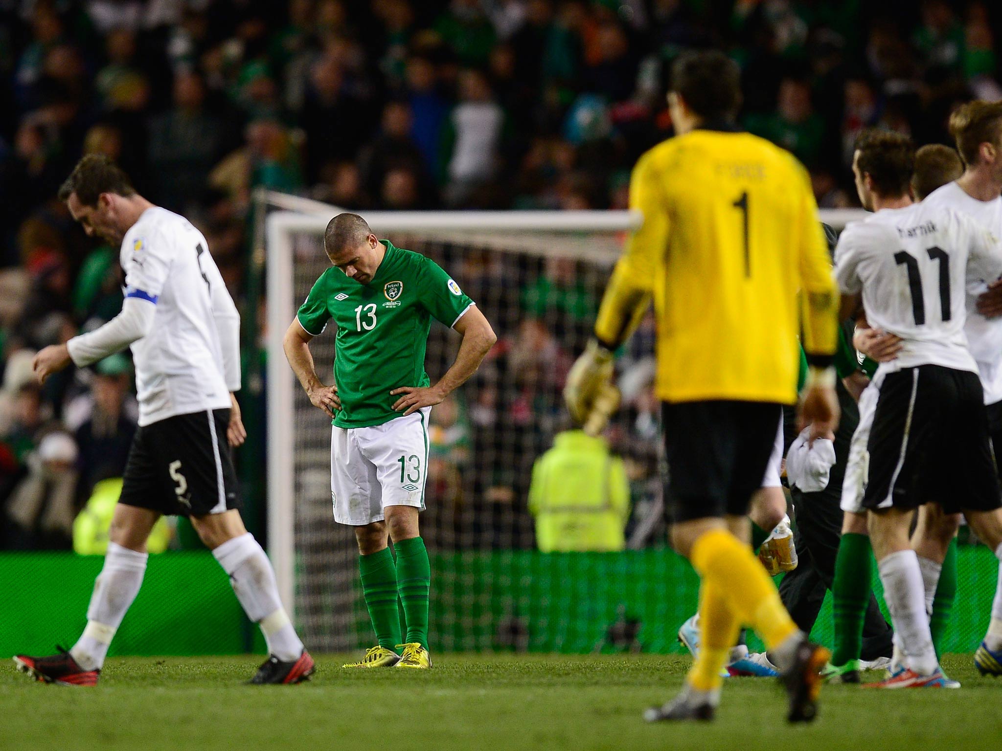 Ireland player Jonathan Walters looks dejected at the end of Ireland's 2-2 draw with Austria