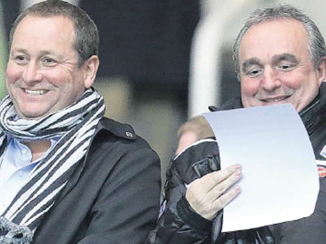 Mike Ashley (left) shares the good news with Derek Llambias