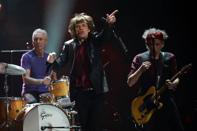 The Rolling Stones, Charlie Watts (L), Mick Jagger (C) and Keith Richards (R) perform during '12-12-12 The Concert For Sandy Relief' December 12, 2012 at Madison Square Garden in New York.