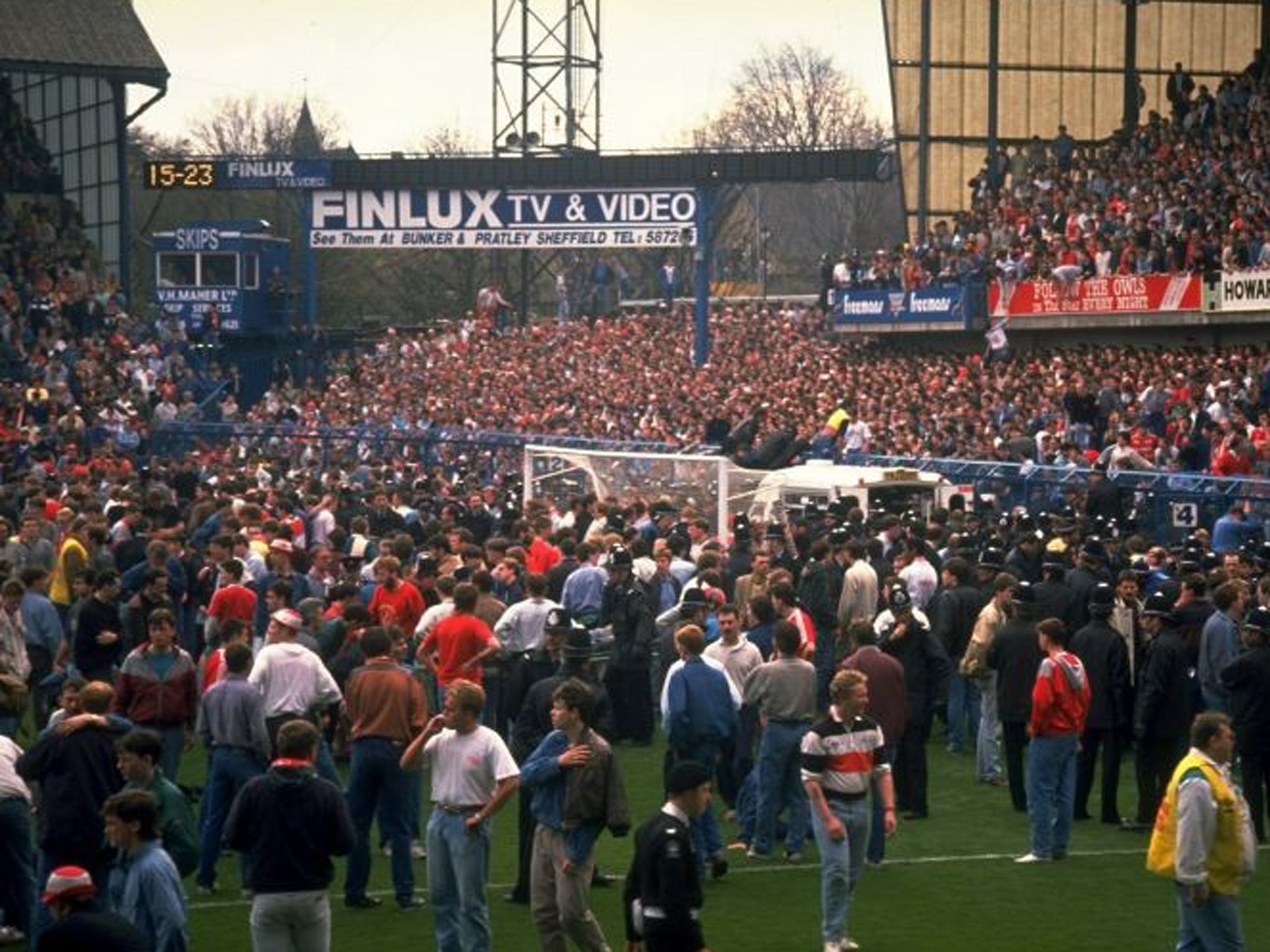 Supporters are crushed against the barrier as disaster strikes before the FA Cup semi-final match between Liverpool and Nottingham Forest played at the Hillsborough Stadium in Sheffield in April 1989