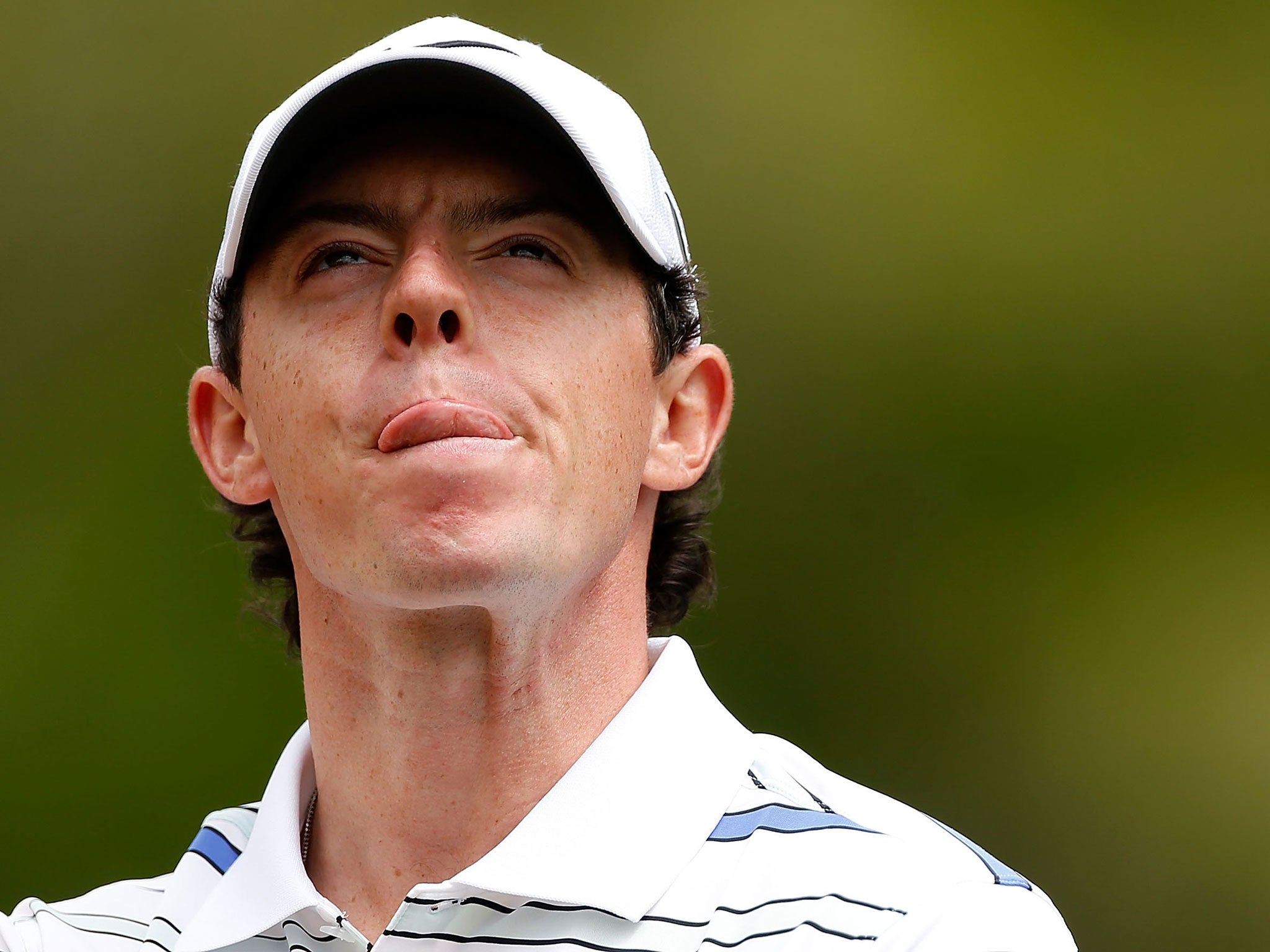 Rory McIlroy fired three birdies in succession after a poor start