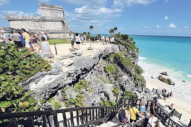 Cliff note: Tulum's Mayan ruins above the beach