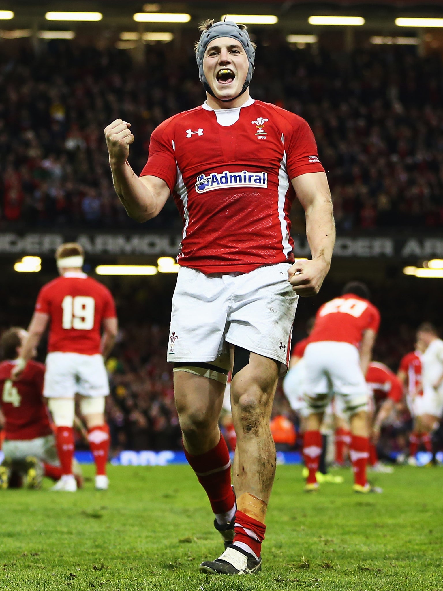 Jonathan Davies enjoys Wales’ moment of victory against England at the Millennium Stadium