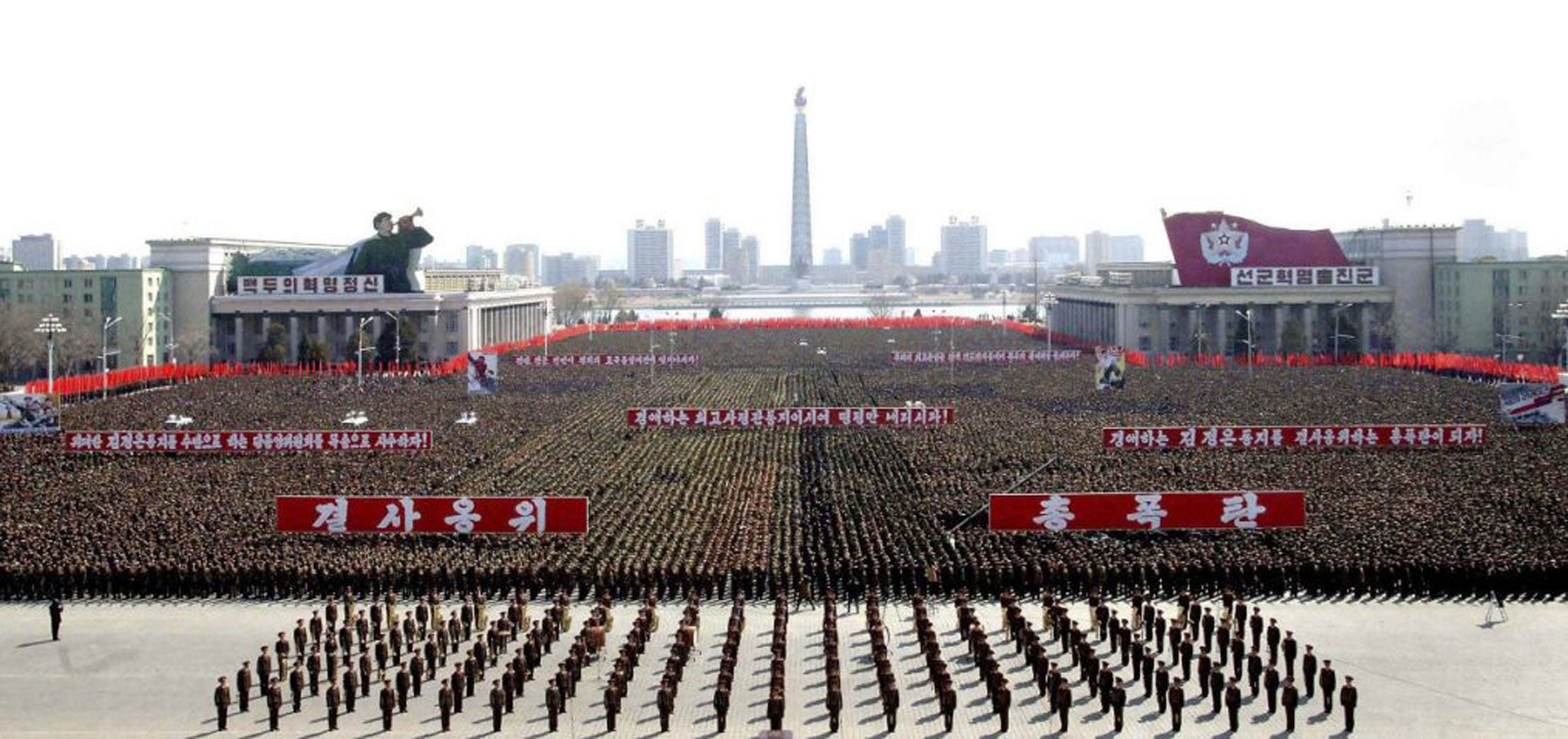 This photo released by North Korea shows a gathering at Kim Il Sung Square in Pyongyang