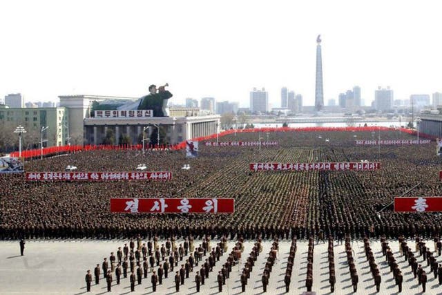 This photo released by North Korea shows a gathering at Kim Il Sung Square in Pyongyang