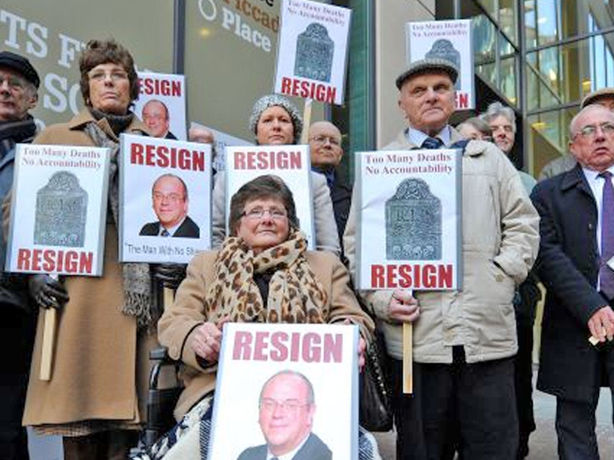 Protesters in London demand that Sir David Nicholson go