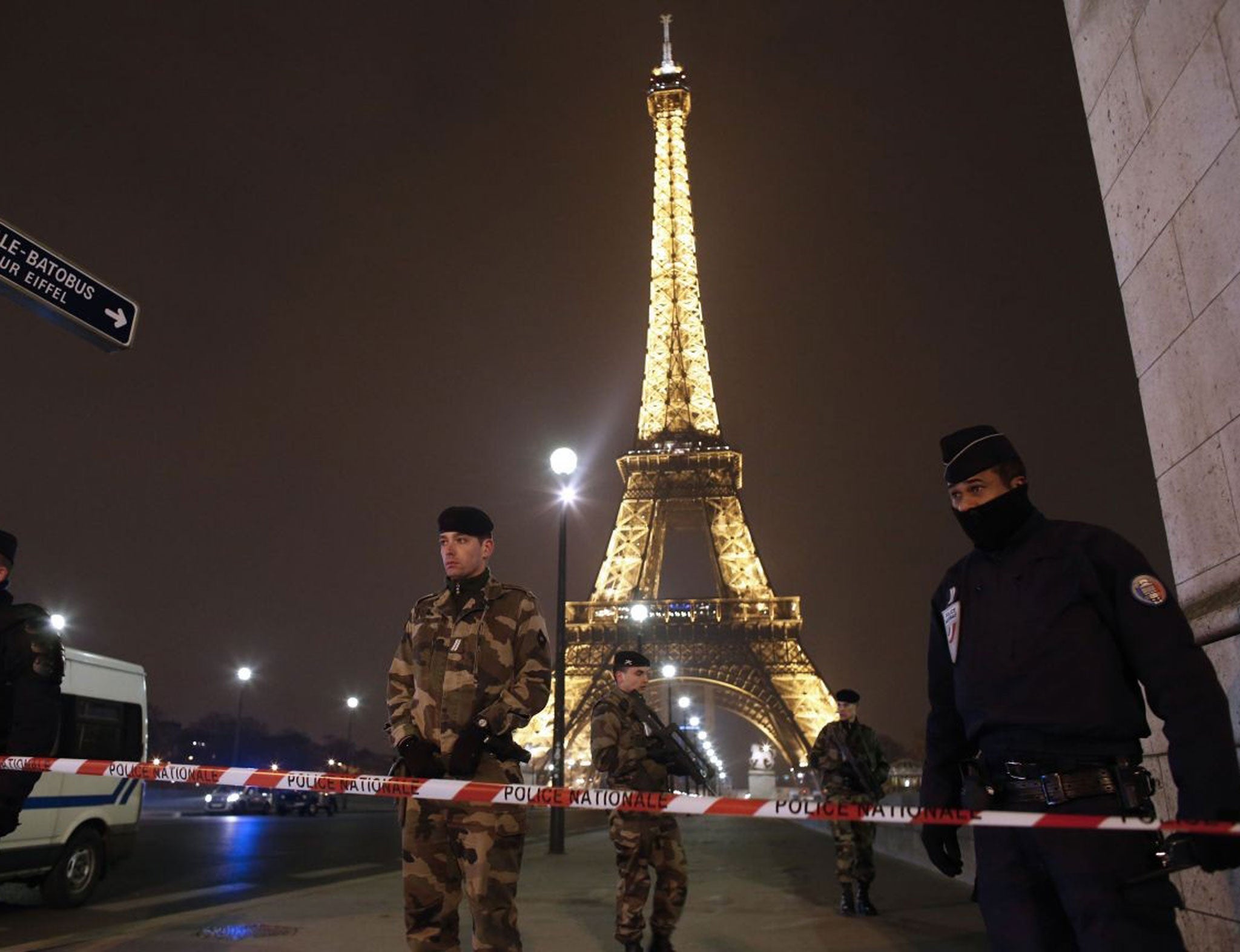 Paris' Eiffel Tower was cordoned off yesterday after an anonymous call about an attack