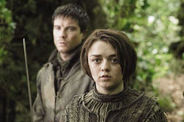 Joe Dempsie and Maisie Williams in a scene from Game of Thrones