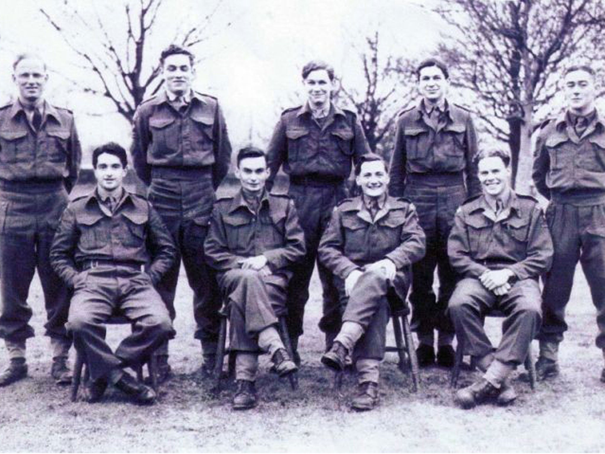 Pool, second left, back row; his medal citation described how he held an outpost for 21 hours