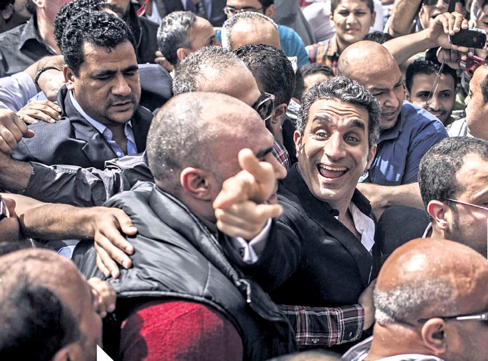 The comic Bassem Youssef arrives at court in Cairo today in what has been termed a political witch-hun