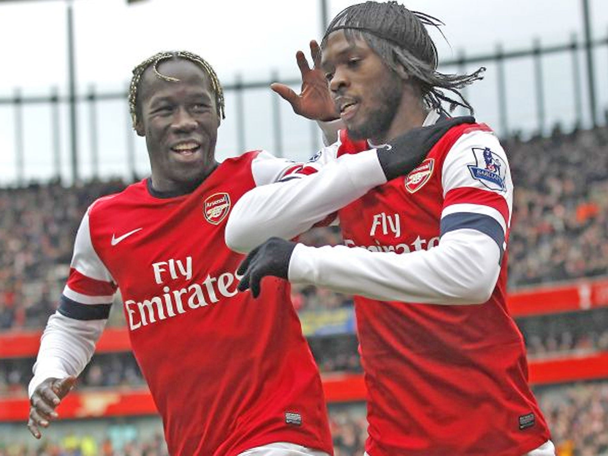 Gervinho (right) is congratulated on his goal by Bacary Sagna