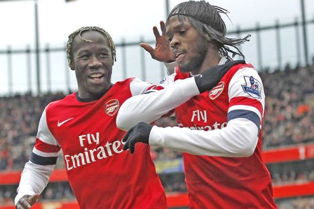 Gervinho (right) is congratulated on his goal by Bacary Sagna